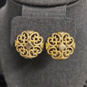 Avon signed clip on circle gold tone earrings